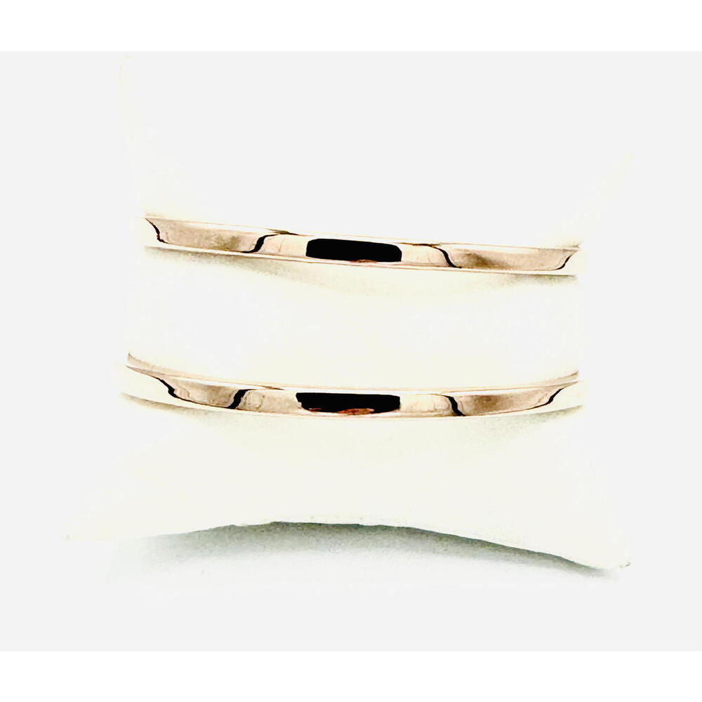 Pair of rose gold plated sterling silver bangles; marked R 925